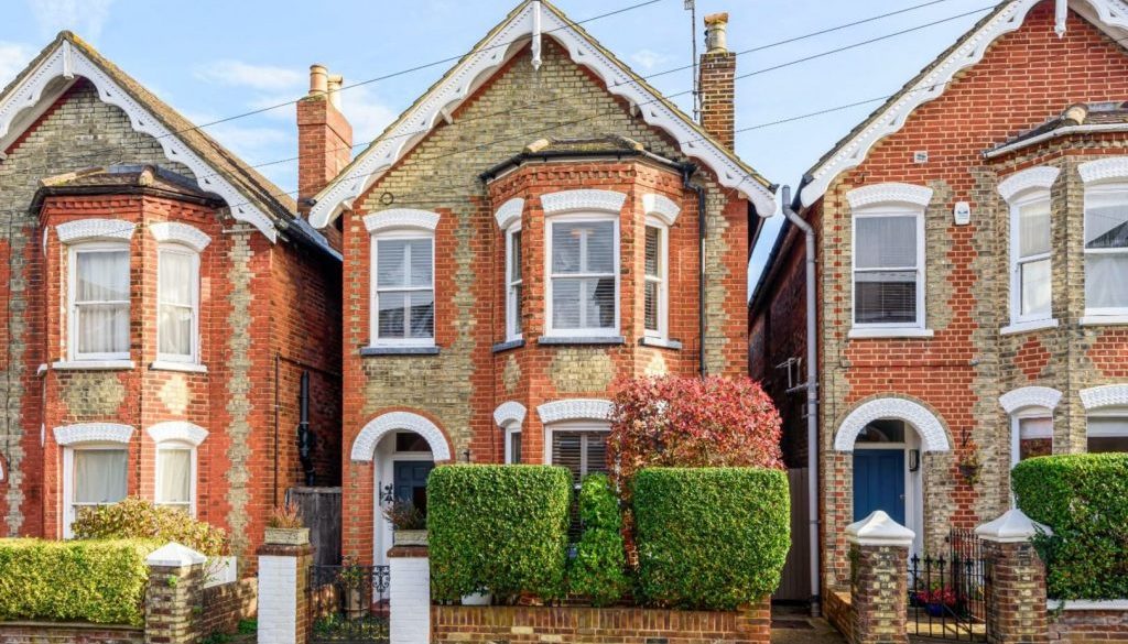 A detached house that has been converted into multiple flats.