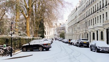 winter snow covering roads and houses in London.